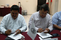 Firma UNACAR importante acuerdo empresarial